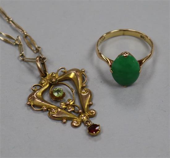 A 14ct gold and jade ring and a 9ct gold Art Nouveau pendant on chain.